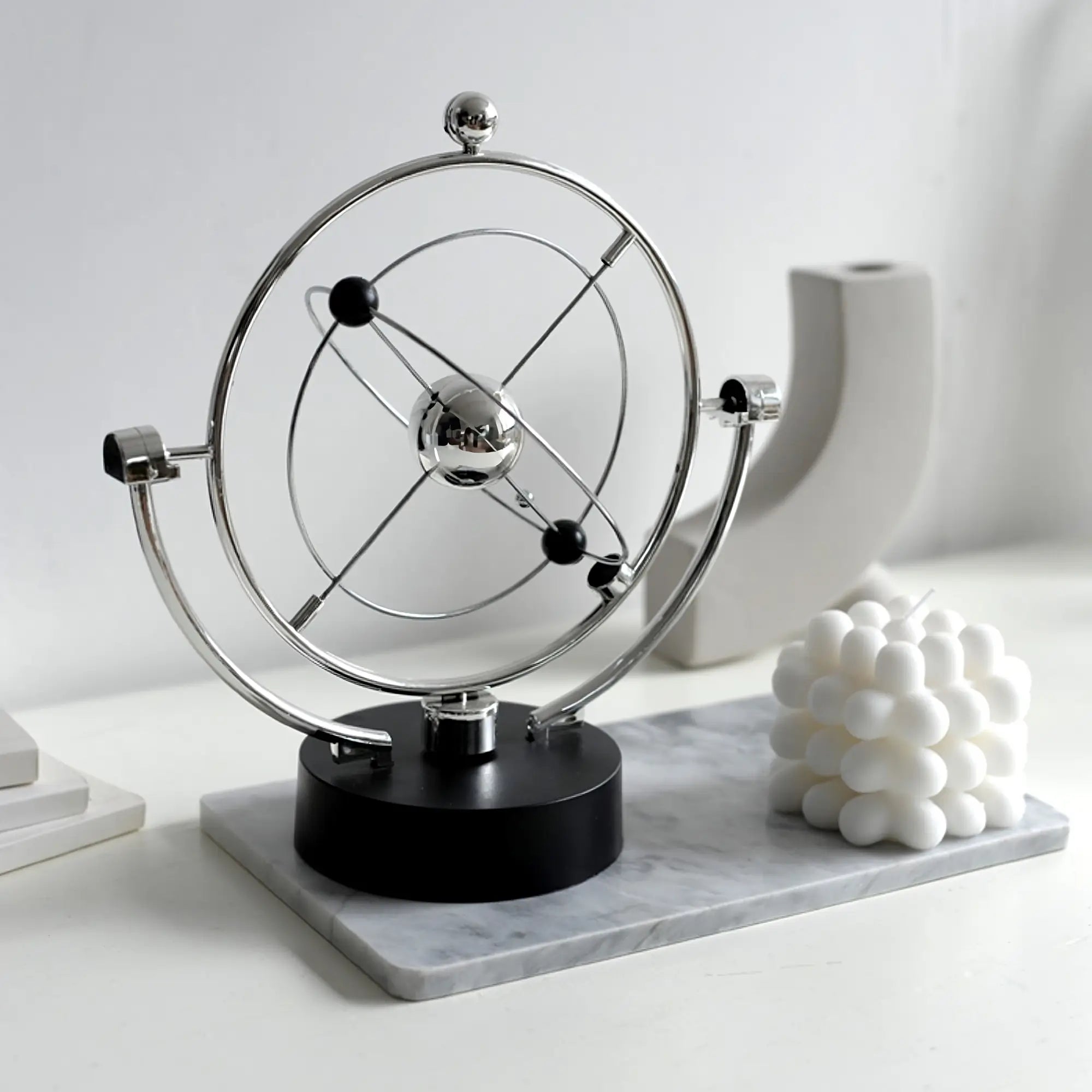 Kinetic orbital art module