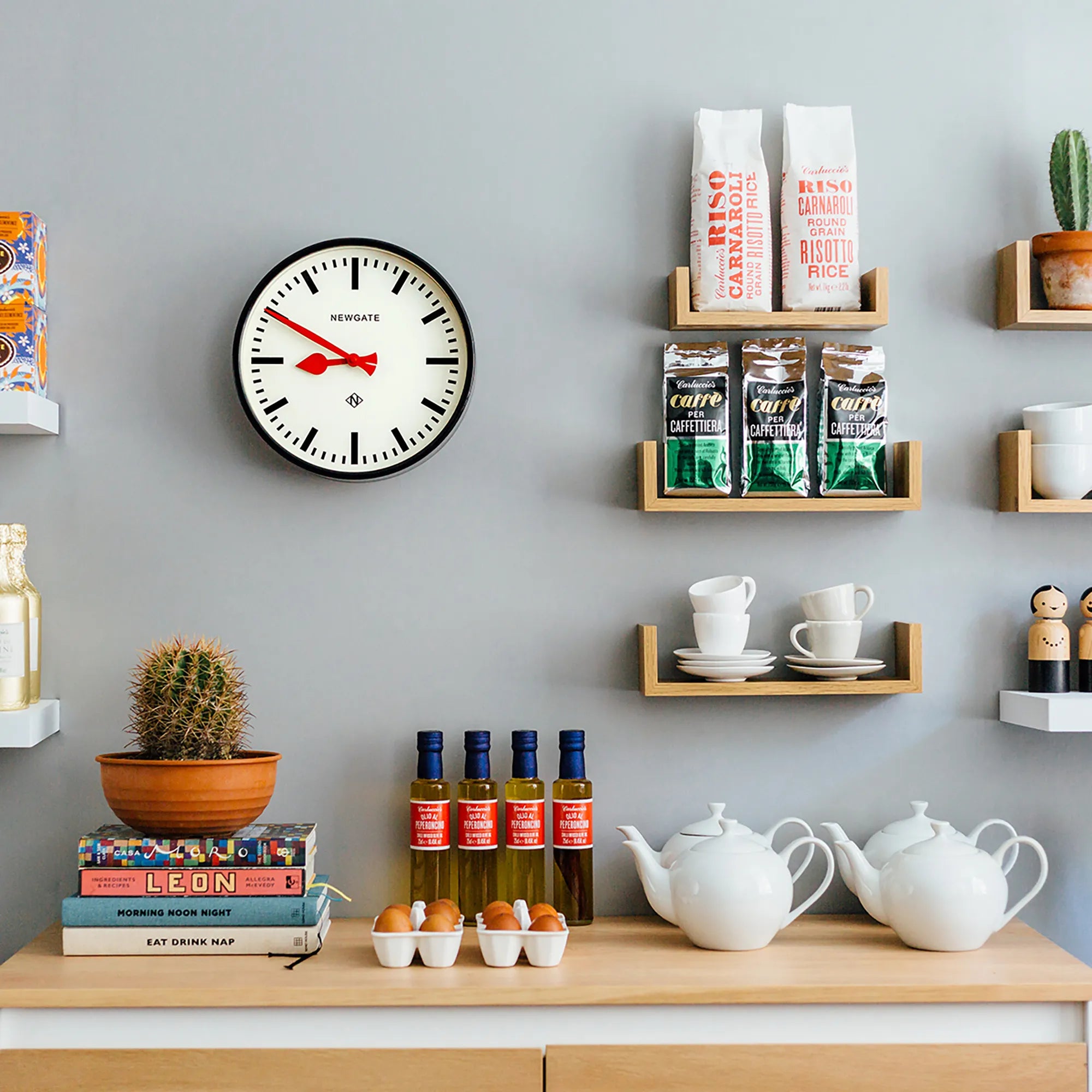 Newgate Luggage Wall Clock in Black