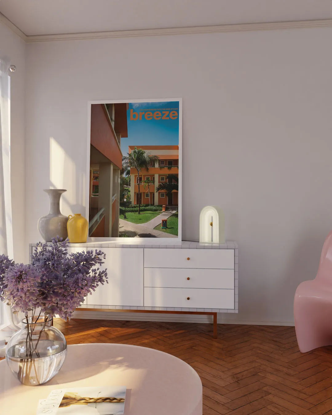 テレビボードの上に飾られたホワイトフレームの「Breeze」ポスター。軽やかで爽やかな印象のモダンアートポスター